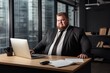 © MadMouse - Office worker, beautiful man at workplace. Plus-size manager