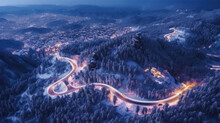 Aerial View Captures A Mountain Hamlet Under The Night Sky. A Breathtaking Winter Landscape.