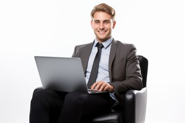 Aufkleber - Young smiling businessman sitting in office chair and working on laptop computer isolated on white background : Generative AI