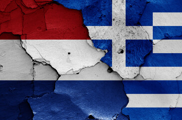 Wall Mural - flags of Netherlands and Greece painted on cracked wall