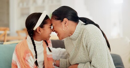 Sticker - Happy, relax and mother with daughter on sofa for playful, bonding and love. Smile, happiness and care with woman and young girl in living room of family home for hug, fun and games together