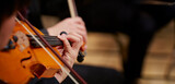 Fototapeta  - Close up of musician hands playing violin