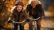 shot of a kid teaching an elderly person to ride a bicycle in autumn