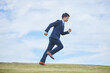 スーツで走る男性　man running in suit