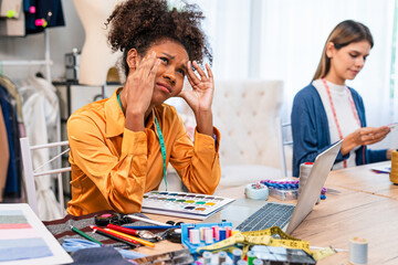 Fashion design concept, young stylish woman fashion designer working in studio office, small business owner creating new fashion design cloth in atelier.