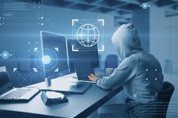 Sticker - Side view of hacker at desk using computers with creative hacking interface on blurry interior background. Code window high tech UI and spyware concept.