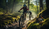 Fototapeta  - Mountain Bike cyclist riding mountain bike with friends along a trail in a misty forest.