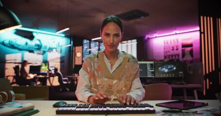 Aufkleber - POV from Monitor Screen: Portrait of a Woman Using Desktop Computer in a Creative Agency Lit by Neon Lights. Female Designer Working on Artistic Digital Projects, Browsing Internet or Shopping Online