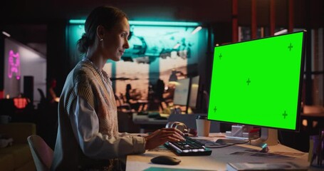 Aufkleber - Zoom in Portrait of Young Woman Sitting at Her Desk Using Desktop Computer with Mock-up Green Screen. Female Caucasian Specialist Working on Computer with Chroma Key Display at Creative Agency