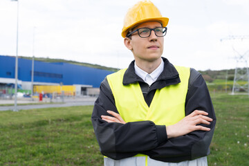 Poster - Portrait of engineer in helmet and glasses
