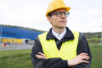 Poster - Portrait of engineer in helmet and glasses