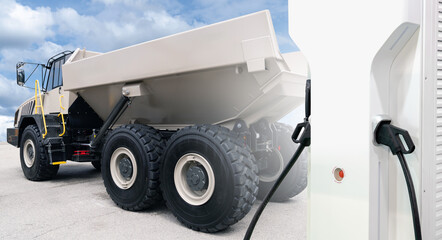 Sticker - Electric charging station on a background of electric mining truck. Concept.