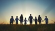 © maxximmm - large family walks across the field holding hands. happy family childhood dream concept. family walks across the field on the grass at sunset and lifestyle hold each other's hands dark silhouettes