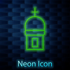 Sticker - Glowing neon line Christian church tower icon isolated on brick wall background. Religion of church. Vector