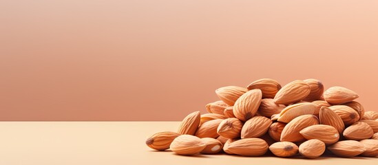 Poster - Almonds stacked against a isolated pastel background Copy space