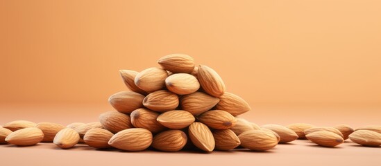 Poster - Almonds stacked against a isolated pastel background Copy space