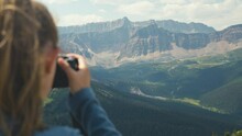A Woman Taking Pictures, On The Top Of A Mountain Peak, At The Bald Hills Trail Of Stunning Landscape Of Jasper National Park In Canada