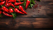 © sopiangraphics - A wooden surface showcases red peppers, complemented by a designated copy space.