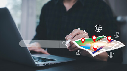 Aufkleber - man using smartphone with virtual world and model map with location point, gps app, icon travel maps