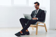 © SHOTPRIME STUDIO - Man technology occupation winner job looking chair office laptop sitting business businessman happy
