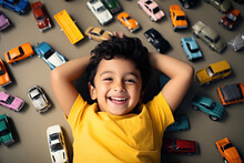 Indian Small Kid Playing With Toy Car At Home, Happy Expressions
