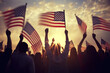 Silhouettes of people holding the american flag on sunset background