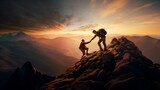 Fototapeta Góry - Mountain hiker extends helping hand to teammate