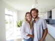 © id512 - happy young smiling couple moves to new apartment