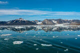 Fototapeta Morze - Stunning landscapes with jagged mountain peaks, glaciers and icebergs along the shores of the Liefdefjorden, Northern Spitsbergen, Svalbard, Norway