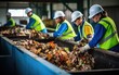 Food waste recycling facility in action, with employees sorting organic waste for composting, highlighting sustainable waste management practices