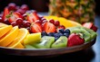 Fruit platter with various sliced fruits