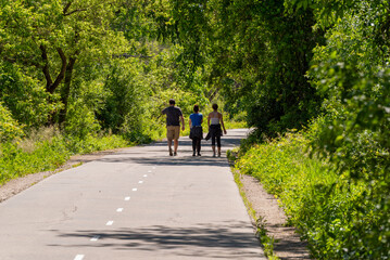 Wall Mural - Walkers On The Fox River State Trail In Summer Near De Pere, Wisconsin