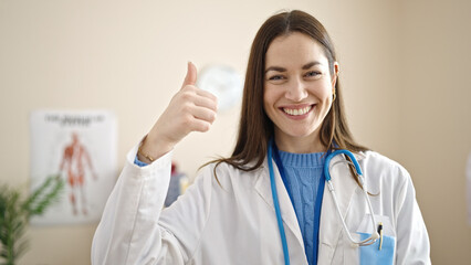 Sticker - Young caucasian woman doctor doing thumb up at clinic