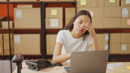 Poster - African american woman ecommerce business worker using laptop stressed at office