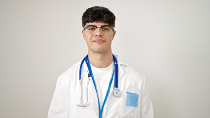 Canvas Print - Young hispanic man doctor smiling confident standing over isolated white background