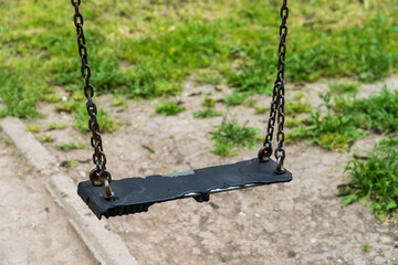 Wall Mural - Children's swing. Background with selective focus and copy space