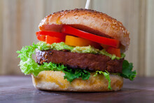 Tasty Healthy Vegetarian Hamburger Made With Soybean Rissole, Tomatoes, Pepper And Lettuce
