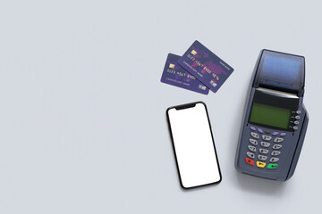 Canvas Print - Mobile phone with credit cards and payment terminal on light background