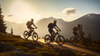 Three mountain bikers friends riding their electric bicycles to the top in amazing sunlight.