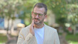 © stockbakers - Outdoor Portrait of Middle Aged Man with Toothache