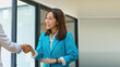 © Songsak C - Businesswomen greet with shake hands to congratulate after agreement with their partner. Two business partners greet each other.