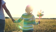 Park, Mother, Daughter, Little Girl Joyfully Hold Hands, Play Parenting Game Form Tight Knit Team Walk Dreamy Sunset, Sun Enjoying Outdoors. Its Beautiful Moment, Happiness Symbolizing. Spinner Child