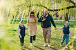 © fotofabrika - Happy family on a walk in the park