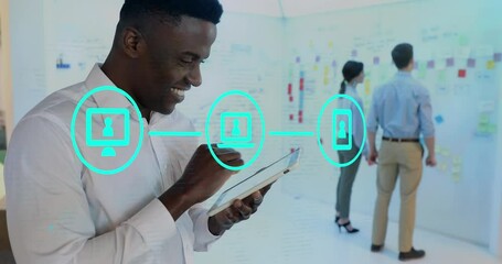 Poster - Animation of network of digital icons over portrait of happy african american using tablet at office