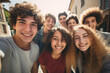© Steffen Kögler - Group of teenage friends taking selfie photos with cell phone and laughing happily - Youth and Friendship Theme - Generative AI