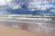Baltic Sea coast and wild beach with rain clouds on the horizon, Poland