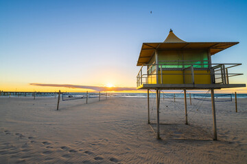 Wall Mural - Glenelg Beach Surf life saving tower at sunset, South Australia
