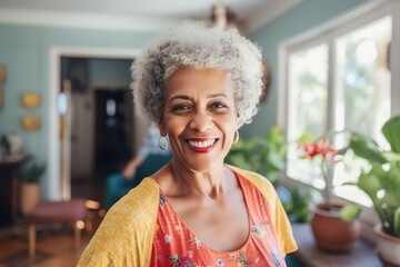 Senior black woman taking selfie at home