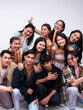 © Mdv Edwards - A diverse group of ten young asian college students posing together smiling. 5 women, 4 guys and 1 trans woman. Isolated on a white background.