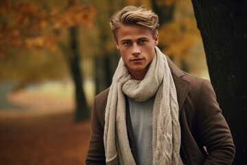 Wall Mural - Portrait of a Elegant Young Fictional Scandinavian Man Model in Casual Chic Autumn Clothes. Generative AI.